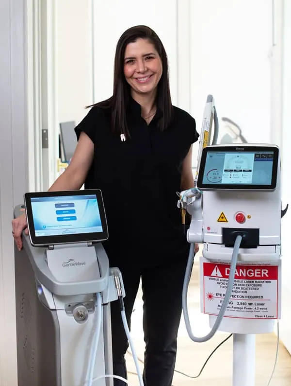 Dr. Jacqueline Lopez Gross standing beside the Fotona laser at 562 endodontics